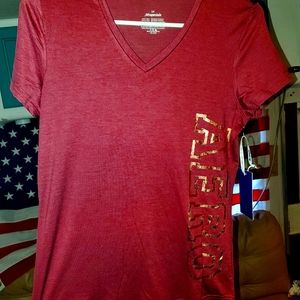 Aeropostal t-shirt Size small pink with Aero in gold down the side